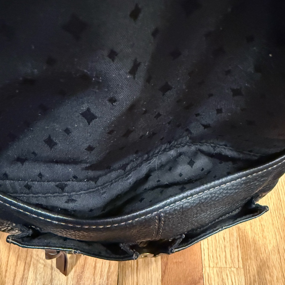 This is a Fossil Morgan Traveler crossbody bag